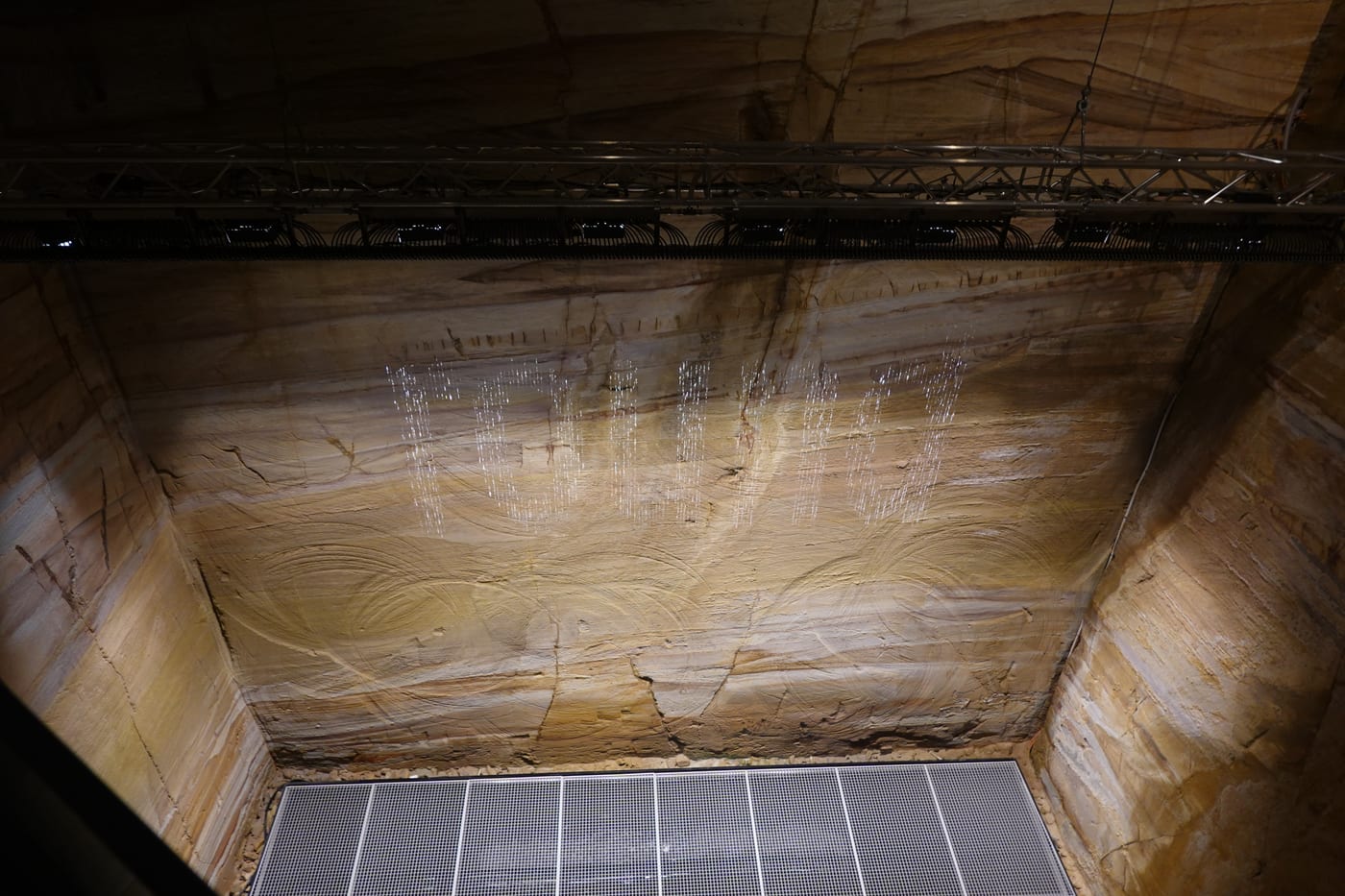 Looking down at the bit.fall water-text installation.