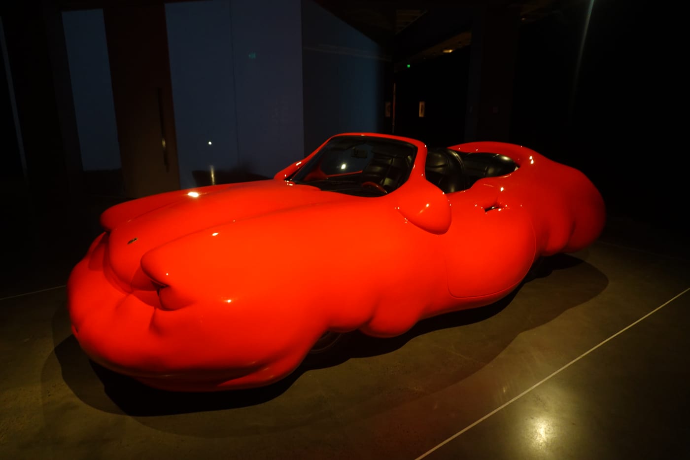 Erwin Wurm's bulging red 'Fat Car' sculpture.